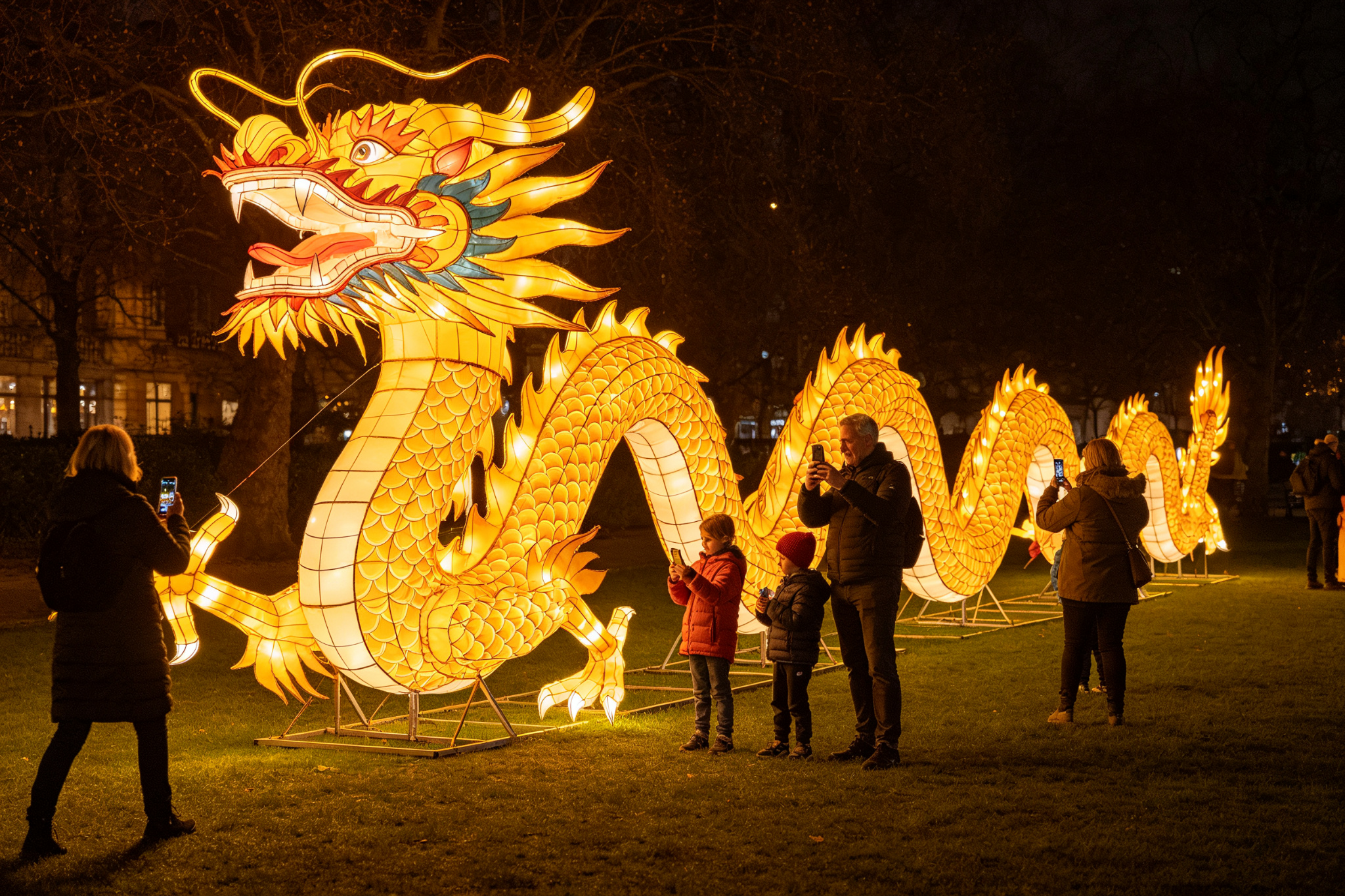 Large golden dragon lantern with steel frame at night festival with tourists